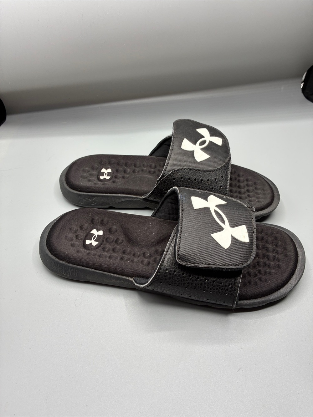 Under Armour Slides size 4Y Sandals Black with White
Accents